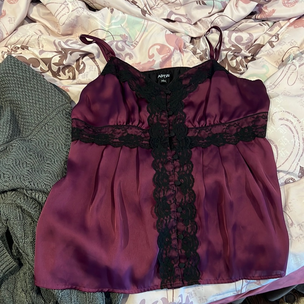 Lace/silk spaghetti strap top. Worn once or twice. Lost weight and now too big.